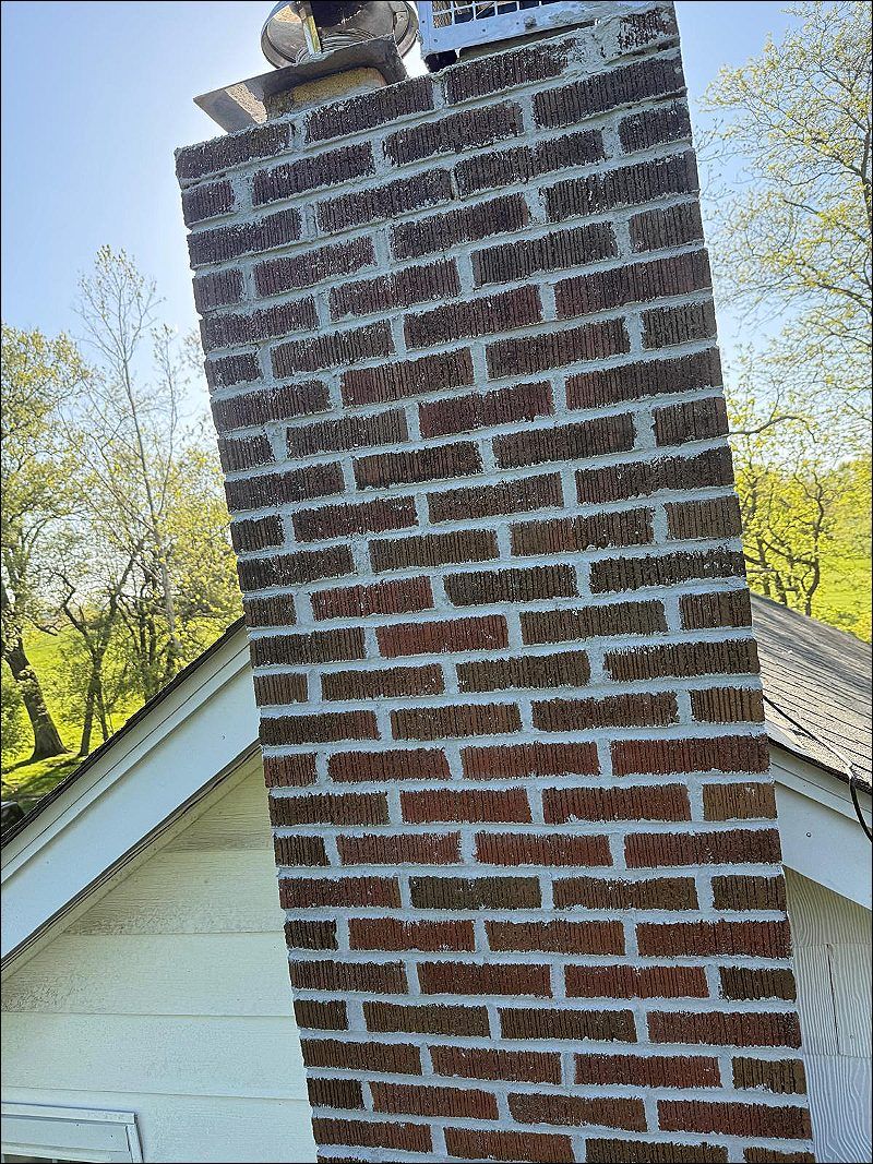 Tuckpointing above roofline in Richmond Hill