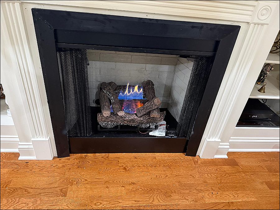 Fireplace after a Northmark chimney sweep, floor clean